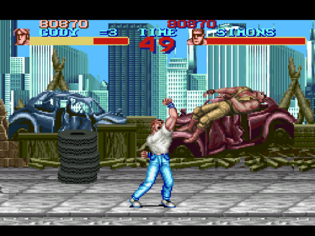 Cody punches enemies in an outdoor area of the game.