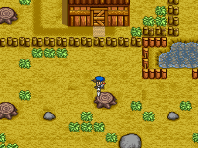 The player attempts to destroy a tree stump on the farm in Harvest Moon.