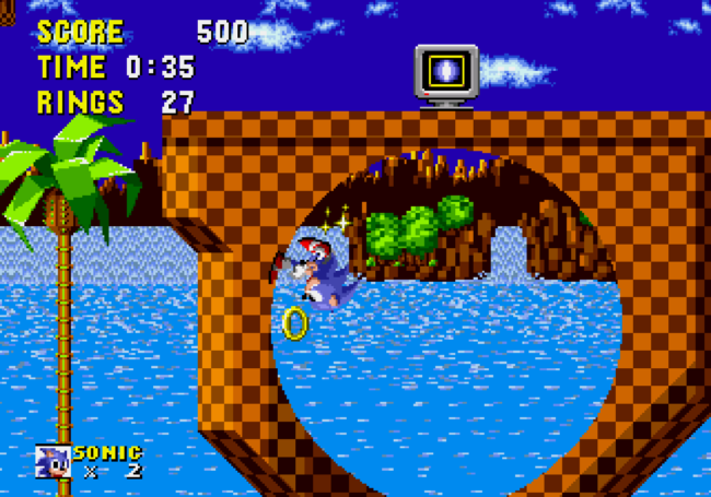 Sonic runs through a loop-de-loop in the Green Hills Zone.