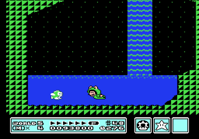 Mario swims in the frog suit.
