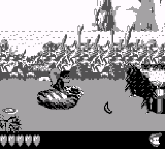 Dixie Kong stands on a leaf in a forest stage.