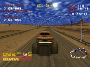 Second screenshot of 4 Wheel Thunder. A red and yellow truck races down the track in a desert scene race track.