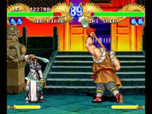 A samurai woman faces off against a large muscleman inside a castle.