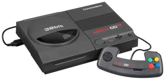 The Amiga CD32 console with one controller plugged in.