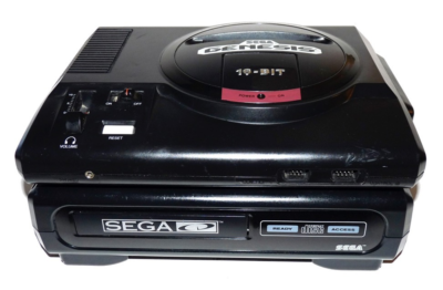 A Sega Genesis console with the CD attachment underneath.