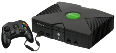 The Microsoft Xbox console with one controller plugged in.