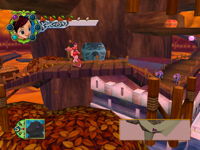 The main character approaches a treasure chest in the Autumn themed land.