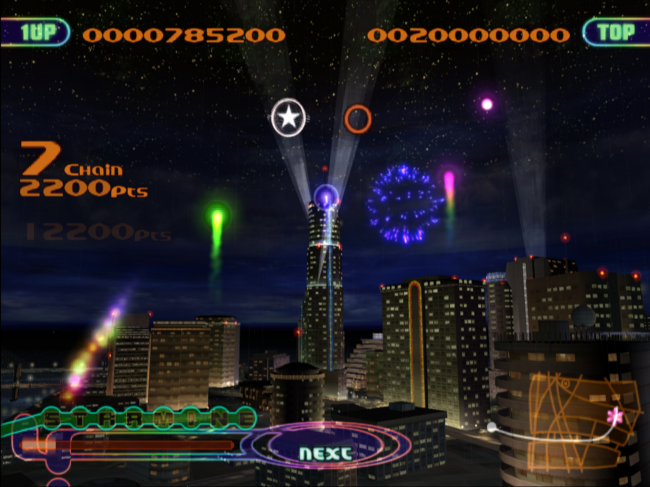 A city scene at night with fireworks exploding in Fantavision.