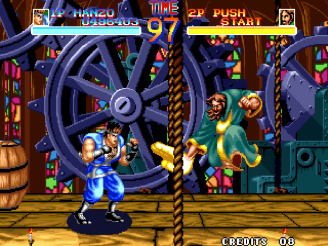 A fight in World Heroes taking place in a factory.