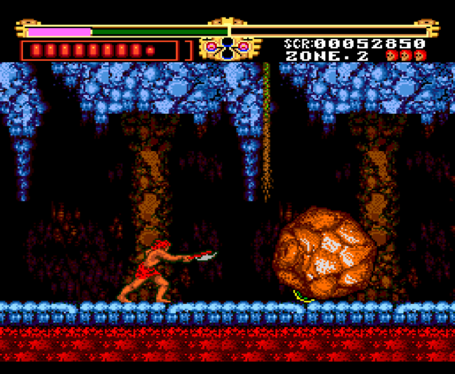 Dodging a boulder in a cave.