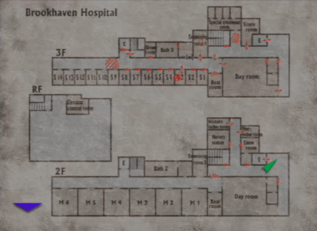 Heather looking at a map of the hospital.