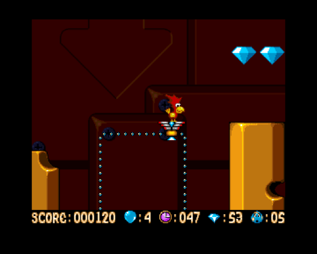 Alfred Chicken manages platforms while collecting gems.