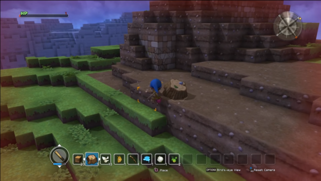 The main character climbs on a mountain in Dragon Quest Builders.