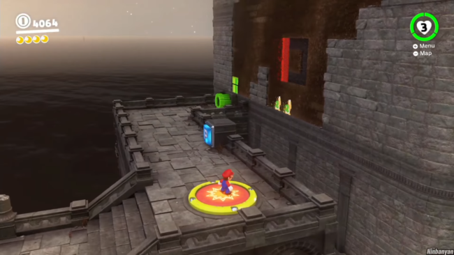 Mario stands on a switch in one of the castle areas.