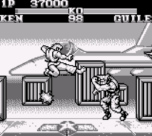 A one-on-one match between Ken and Guile in Guile's stage.