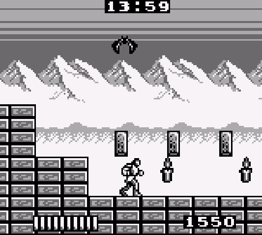 The player navigates a stage filled with platforms and candles.