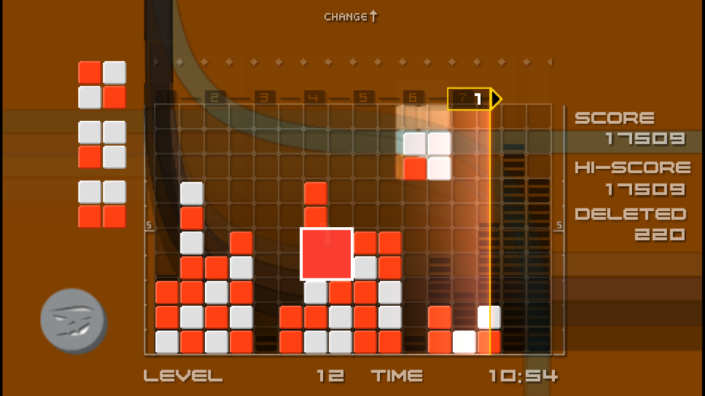 Red and white blocks fall on a partially filled playfield.