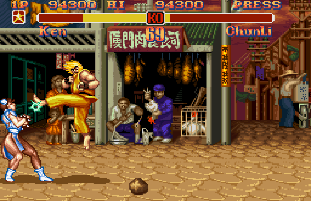 Ken hits Chun Li with a hurricane kick on a revamped version of her stage.