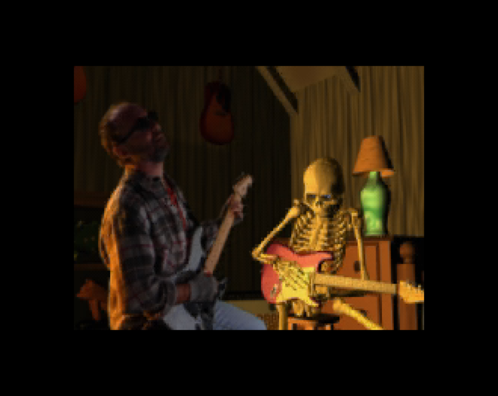 Mr. Bones and a blind jazz musician play guitar together in a dark cabin.