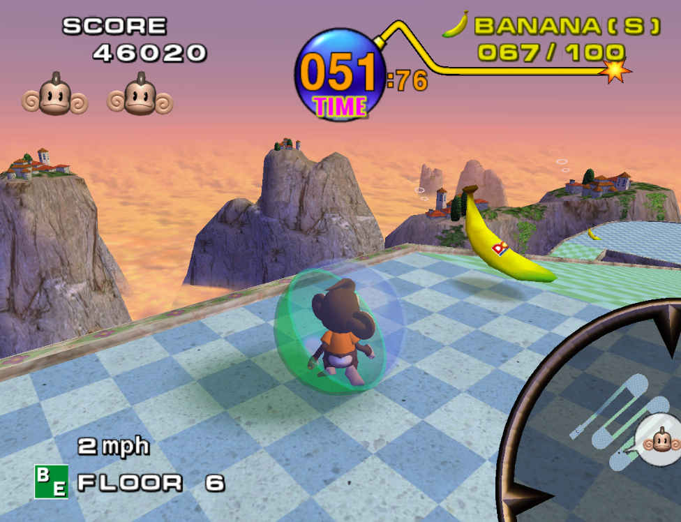 The player guides the monkey around a course at sunset.
