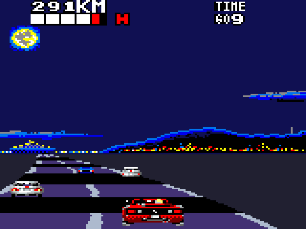 A night time scene with the city lights in the background.