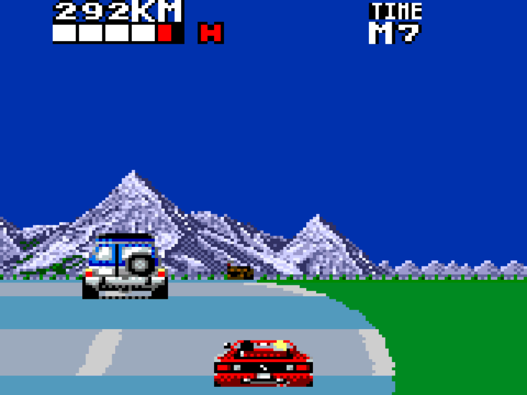An upward slope in the road in a scene with mountains in the background.