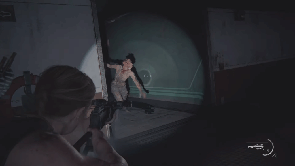 A zombie with fungus covering their face comes out from around a corner in a dark room.