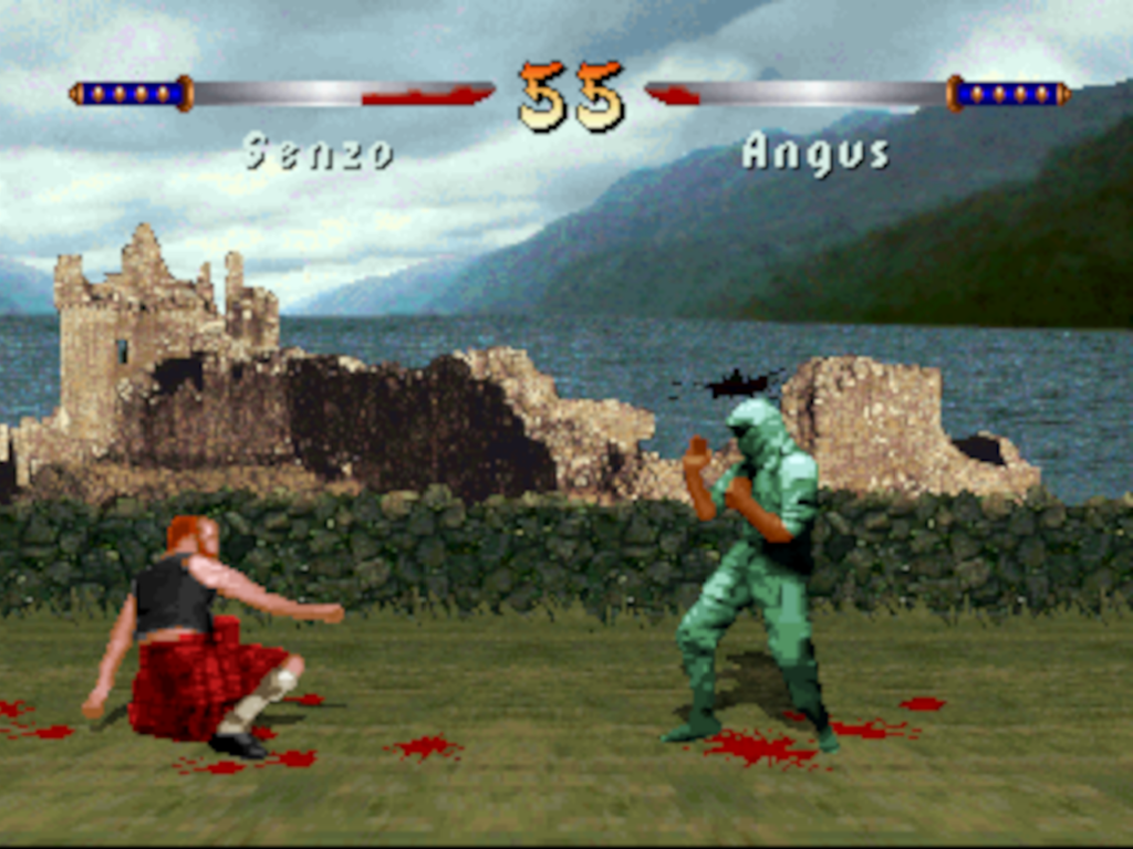 Angus gets off the ground after being knocked down in a stage designed to look like Scotland.