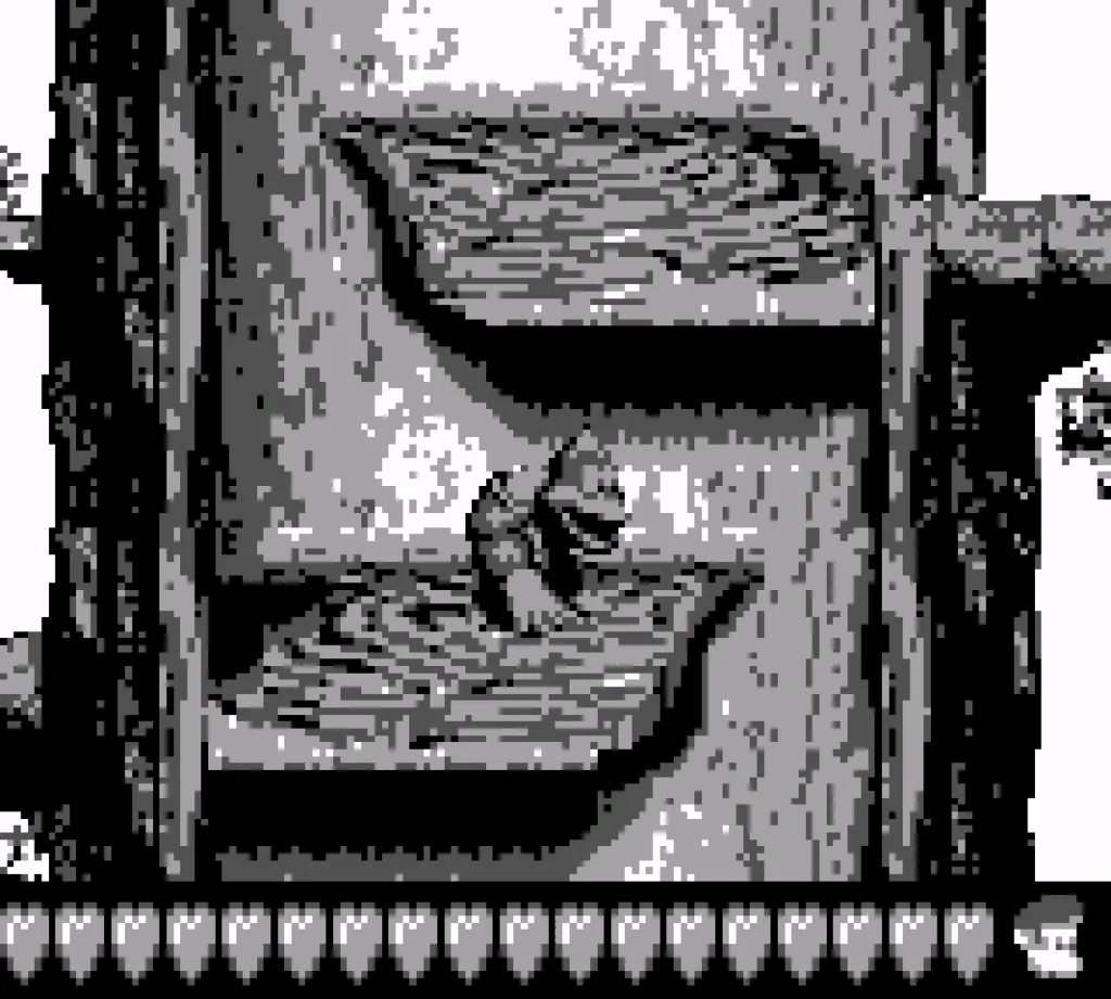 Kiddy Kong stands inside a hollowed out tree.